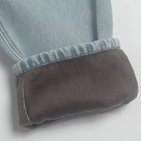 Wixra stylowe spodnie dżinsowe kobiece spodnie jeansowe z futerkiem BF Casual Button spodnie damskie Streetwear jesienno-zimowa 6